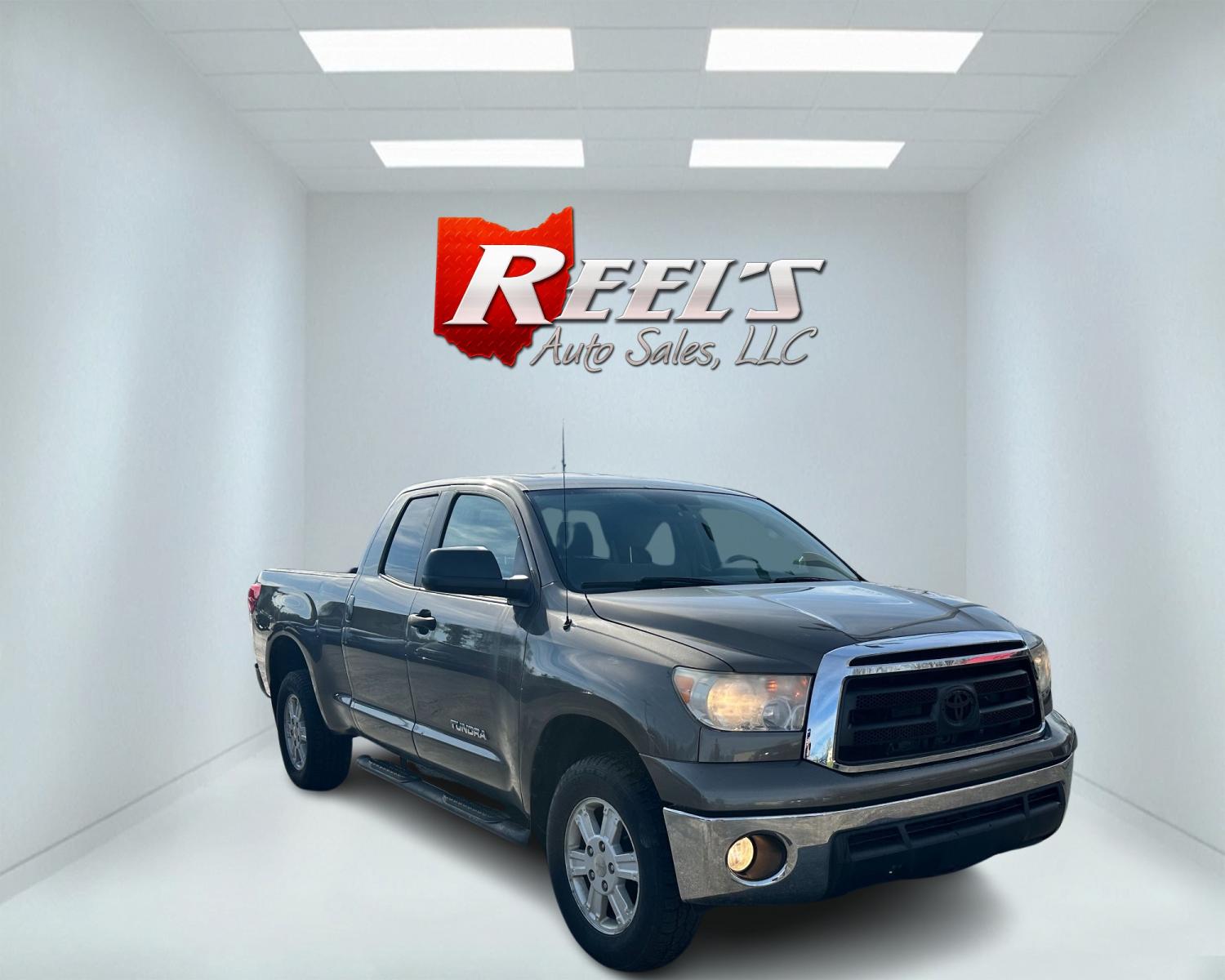 2012 Gold /Beige Toyota Tundra Tundra-Grade Double Cab 4.6L 4WD (5TFUM5F15CX) with an 4.6L V8 DOHC 32V engine, 5-Speed Automatic Overdrive transmission, located at 547 E. Main St., Orwell, OH, 44076, (440) 437-5893, 41.535435, -80.847855 - This 2012 Toyota Tundra Grade Access Cab equipped with a 4.7-liter V8 engine and a 6-speed automatic transmission, paired with a Blizzard snow plow, represents a robust and versatile pickup truck. Designed to handle tough conditions, it offers a strong combination of power, reliability, and utility, - Photo #2